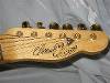 I bought this  directly from Chuck King in the early 90's, he made this creation entirely by hand.  I mean machine  work and all.  Well, maybe not  the tuners. 